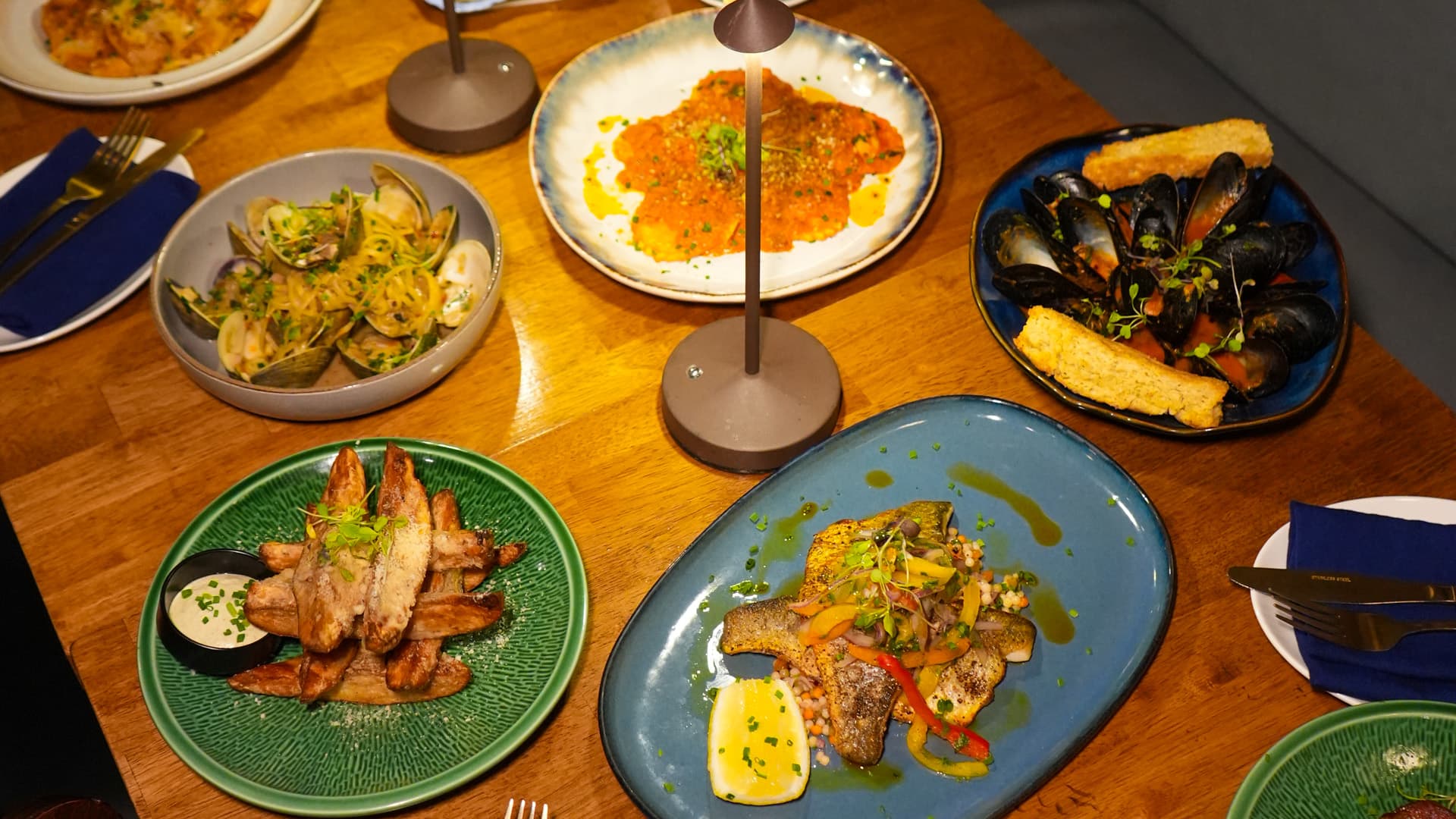 A dinner table set for a rehearsal dinner at Siren