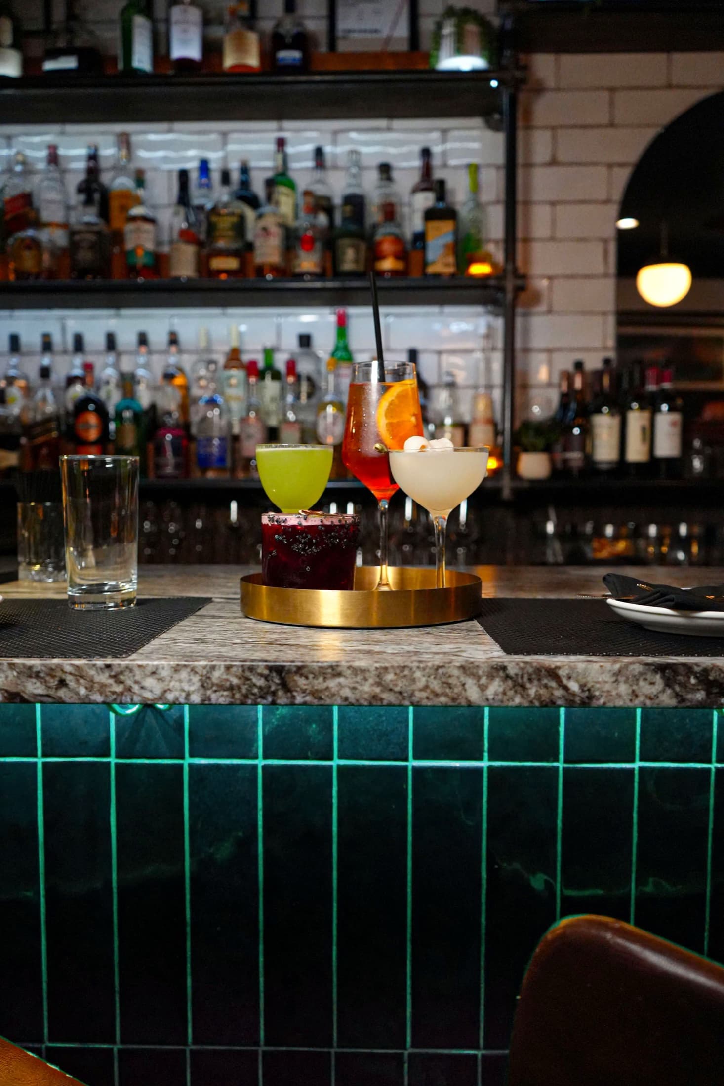 Cocktails arranged across the Siren bar